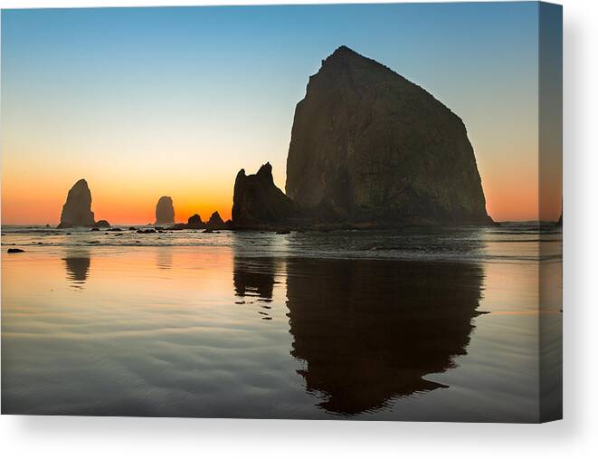 Beaches Canvas Print featuring the photograph Cannon Beach Haystack Rock by Rick Dunnuck