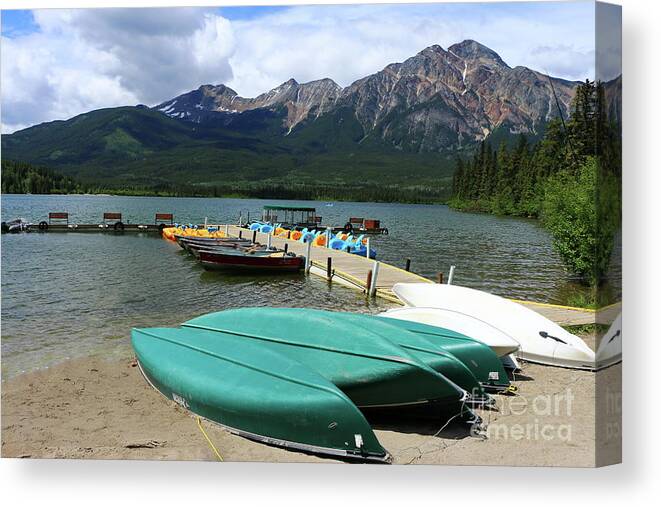 Canada Canvas Print featuring the photograph Canoes At Pyramid Lake by Christiane Schulze Art And Photography