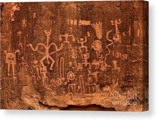 Petroglyphs Canvas Print featuring the photograph Chaco Canyon Petroglyphs by Adam Jewell