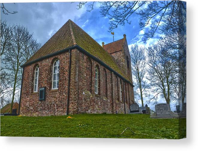 Church Canvas Print featuring the photograph Church On The Mound Of Oostum by Frans Blok