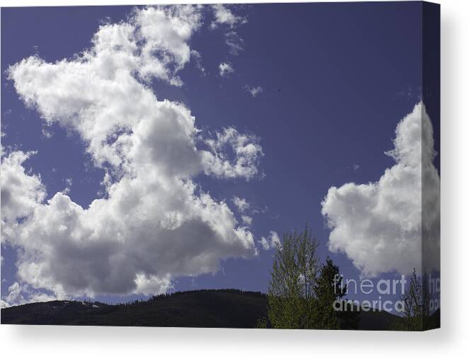 Salmon Arm Canvas Print featuring the photograph Clouds Beckoning by Donna L Munro