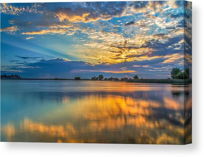 Landscape Canvas Print featuring the photograph Clouds Reflected At Sunrise by Marc Crumpler