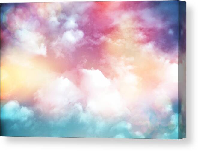 Clouds Canvas Print featuring the photograph Colorful Clouds With Lens Flare by Serena King