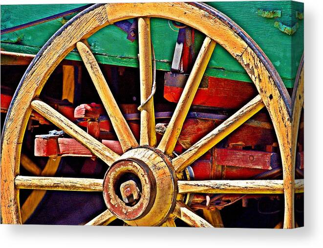 Wagon Wheel Canvas Print featuring the photograph Colorful Wagon Wheel- Fine Art by KayeCee Spain