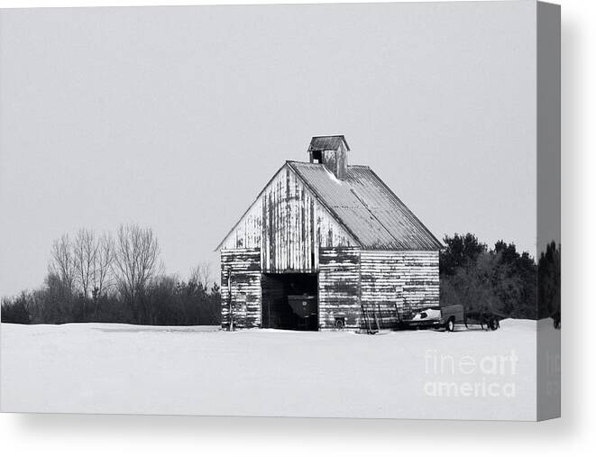 Corn Crib Farm Iowa Agriculture Winter Snow Black White Monochrome Canvas Print featuring the photograph Corn Crib in the Winter by Ken DePue