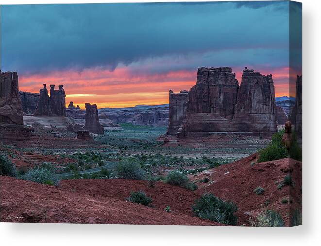 Arches Canvas Print featuring the photograph Courthouse Towers Arches National Park by Dan Norris
