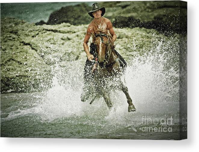 Horse Canvas Print featuring the photograph Cowboy riding horse across the river by Dimitar Hristov