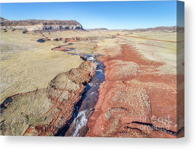 Colorado Canvas Print featuring the photograph creek at Colorado foothills - aerial view by Marek Uliasz