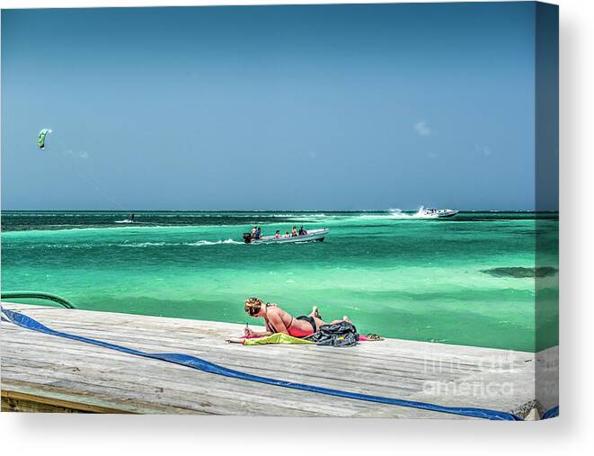 Caye Caulker Belize Canvas Print featuring the photograph Curious Bikini Clad Sunbather by David Zanzinger