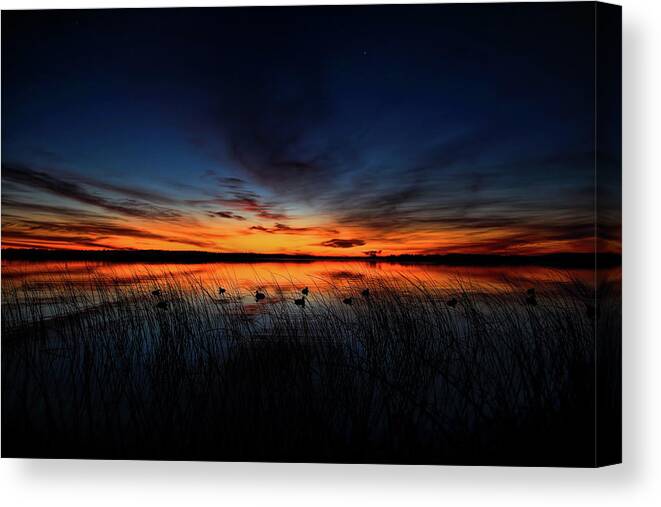 Hunt Canvas Print featuring the photograph Dawn on Thunder Lake by Dale Kauzlaric