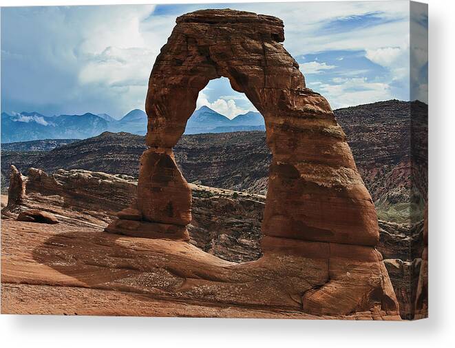 Desert Canvas Print featuring the photograph Delicate Arch by John Christopher