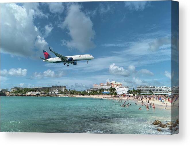 Delta Air Lines Canvas Print featuring the photograph Delta 757 landing at St. Maarten by David Gleeson