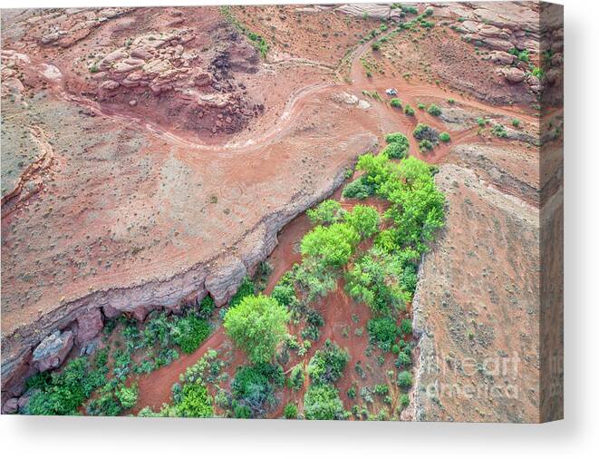 Moab Canvas Print featuring the photograph desert canyon in Utah aerial view by Marek Uliasz