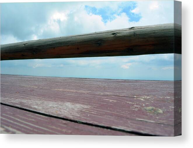Table Canvas Print featuring the photograph Detail of wooden table against the sky. by Oana Unciuleanu