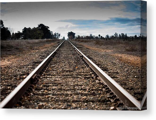 Twin Cities Road Canvas Print featuring the photograph Down the Track by Wendy Carrington