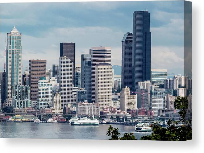 Bainbridge And Bremerton Ferries Canvas Print featuring the photograph Downtown Seattle and Ferries by E Faithe Lester