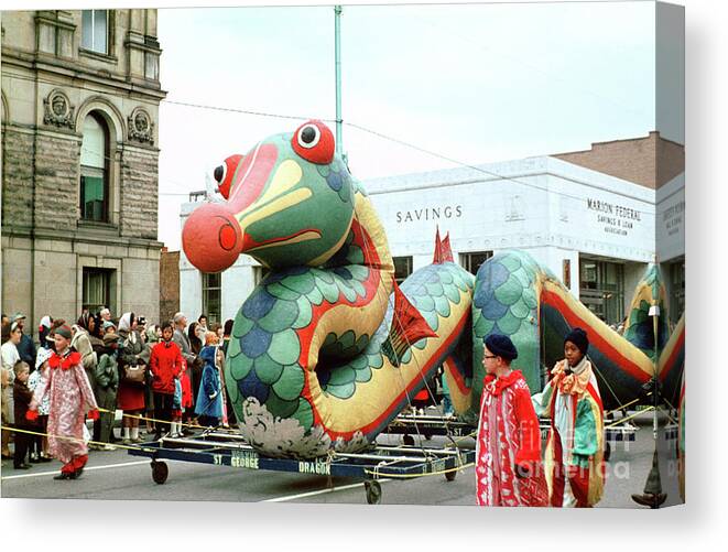 Dragon With A Red Nose Canvas Print featuring the photograph Dragon with a Red Nose in a Parade by Wernher Krutein
