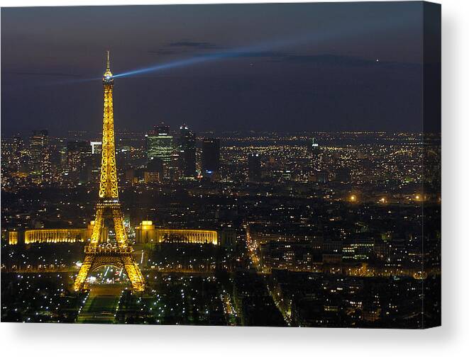 Eiffel Canvas Print featuring the photograph Eiffel Tower at Night by Sebastian Musial
