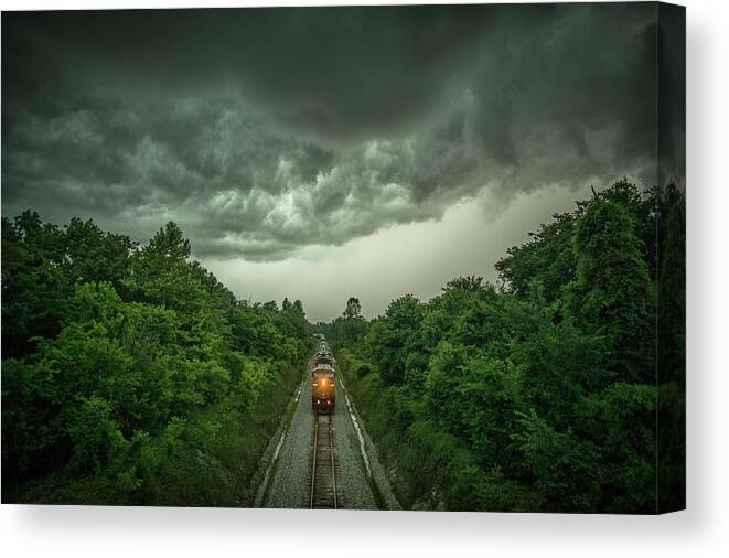 Railroad Tracks Canvas Print featuring the photograph Entering the storm by Jim Pearson