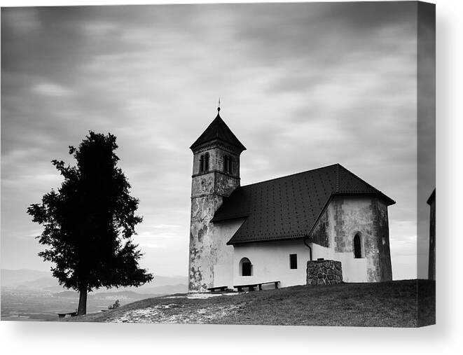 Saint Canvas Print featuring the photograph Evening cloud over church by Ian Middleton