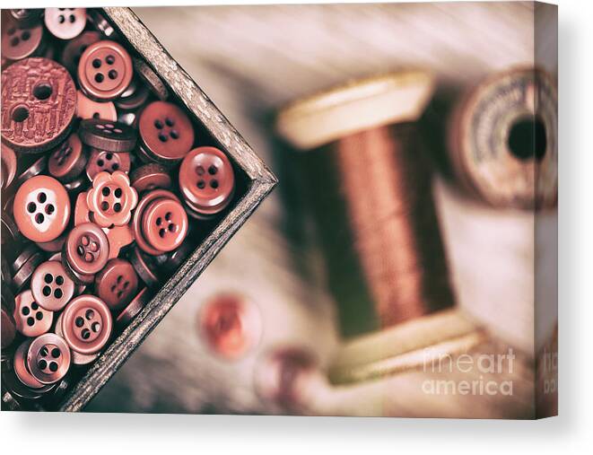Filter Canvas Print featuring the photograph Faded retro styled red buttons and thread by Jane Rix