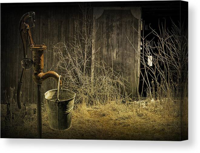Pump Canvas Print featuring the photograph Fetching Water from the Old Pump by Randall Nyhof
