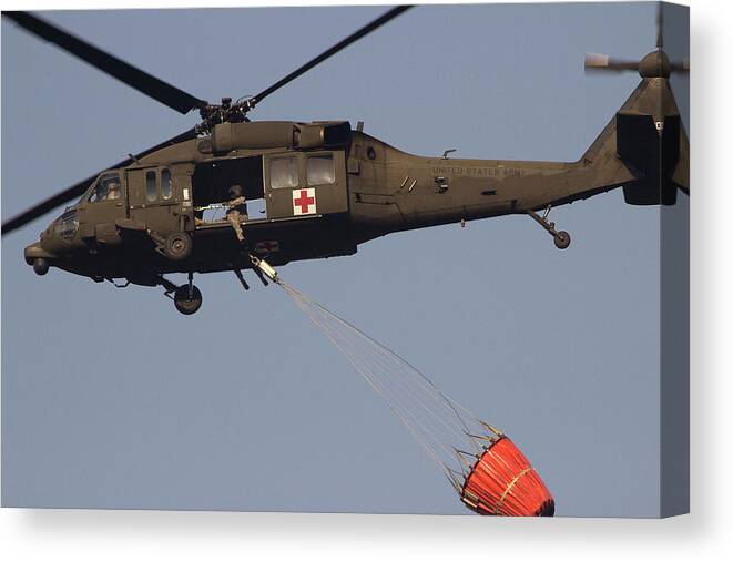 Helicopter Canvas Print featuring the photograph Fire Fighting by Mike Eingle