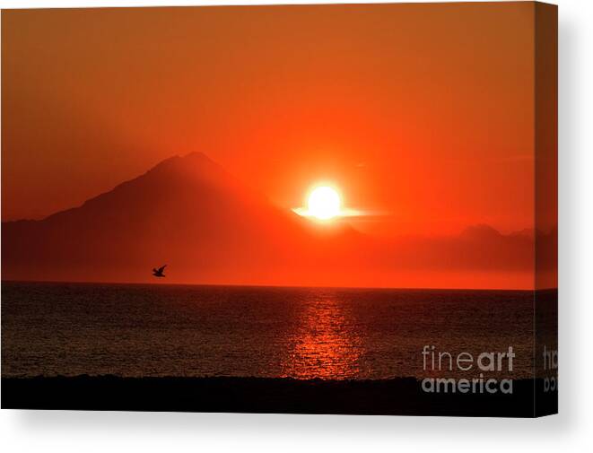 Sunset Canvas Print featuring the photograph Firey Sunset on Mt Redoubt Volcano Alaska by Louise Magno