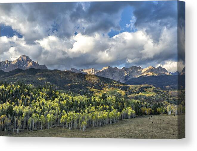 Autumn Canvas Print featuring the photograph First Light on the Sneffels Range by Denise Bush