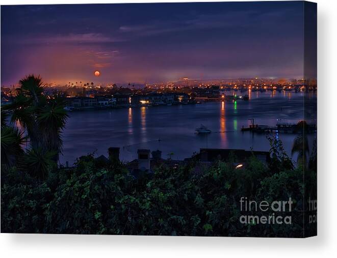 First Canvas Print featuring the photograph First Moonset of 2018 by Eddie Yerkish