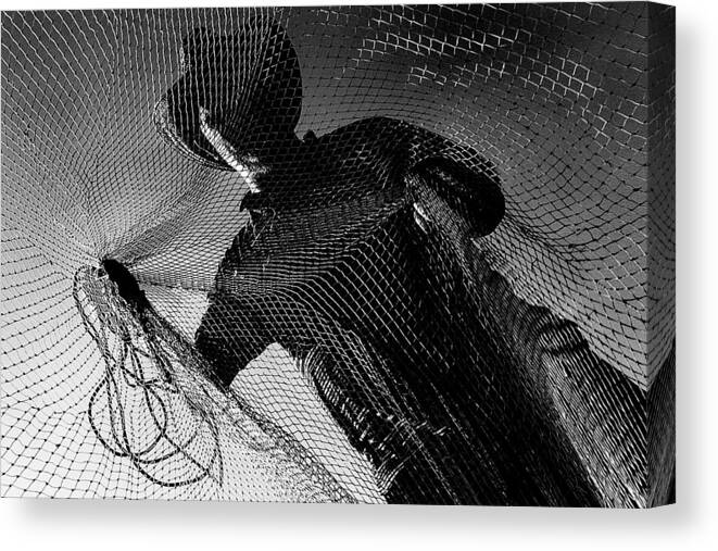 Net Canvas Print featuring the photograph Fisherman by Nurten Ozturk