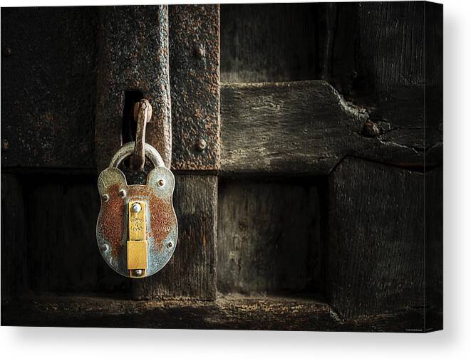 Lock Canvas Print featuring the photograph Forgotten Lock by Ryan Wyckoff