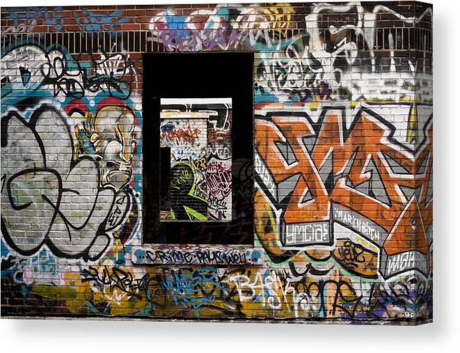 Graffiti Canvas Print featuring the photograph Frames by Kreddible Trout