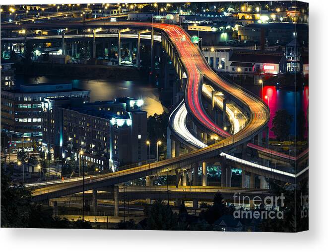 Scenics Canvas Print featuring the photograph Freeway Winds Through Portland, Oregon at Night by Bryan Mullennix