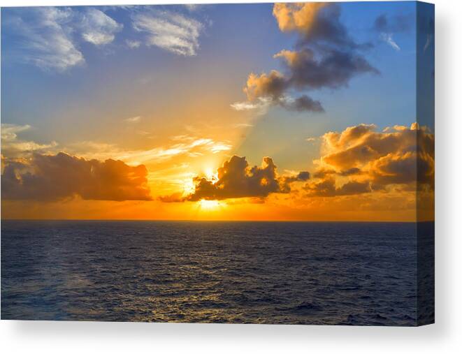 Hawaii Canvas Print featuring the photograph Golden Sunset at Sea by Bill and Linda Tiepelman