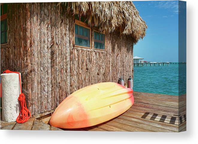 Belize Canvas Print featuring the photograph Grass hut on Ambergris Caye Belize by Waterdancer