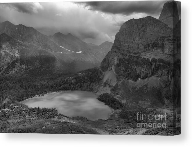 Grinnell Canvas Print featuring the photograph Grinnell Lake Shining Under The Storm Black And White by Adam Jewell
