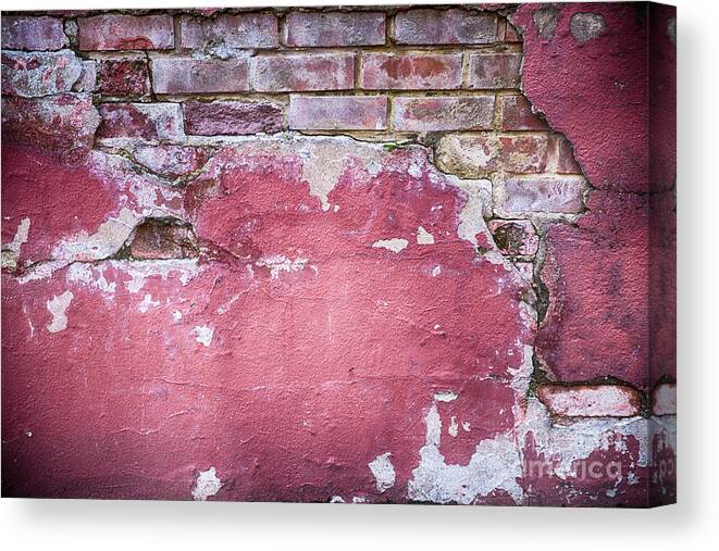 Abandoned Canvas Print featuring the photograph Grunge red wall with broken plaster by Simon Bratt