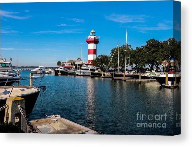 Harbor Town Canvas Print featuring the photograph Harbourtown Lighthouse and Harbor by Thomas Marchessault