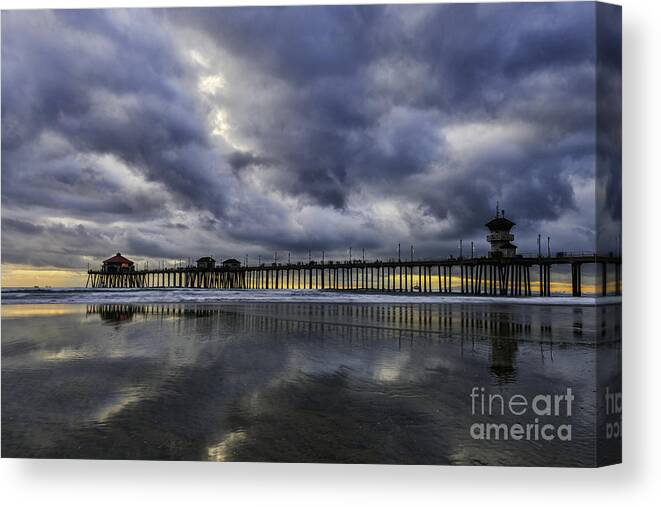 Beach Canvas Print featuring the photograph Huntington Beach Pier Sunset with Reflections by Peter Dang