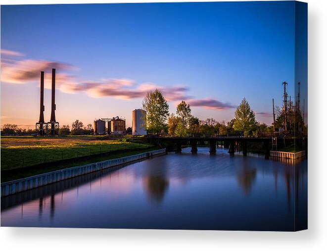 Sugar Land Canvas Print featuring the photograph Imperial Sugar Factory Sunset Outlying Structures Reflections by Micah Goff