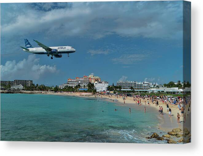 Jetblue Canvas Print featuring the photograph jetBlue landing at SXM airport. by David Gleeson