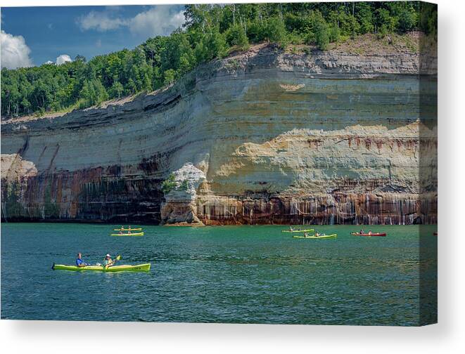 Pictured Rocks National Lakeshore Canvas Print featuring the photograph Kayaking the Pictured Rocks by Gary McCormick