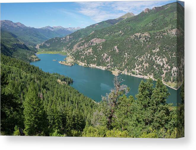 Lake Canvas Print featuring the pyrography Lake San Cristobal by Aaron Spong