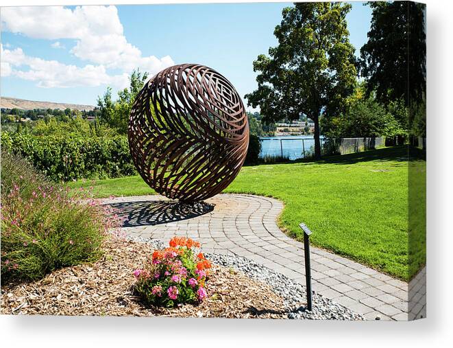 Columbia River Canvas Print featuring the photograph Latticed Iron Ball with Shadow by Tom Cochran