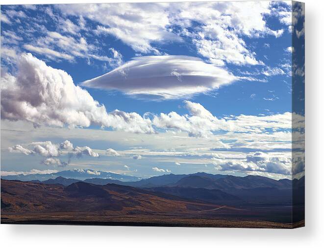 Red Rock Canyon Canvas Print featuring the photograph Lenticular Cloud Over Red Rock Canyon by Viktor Savchenko