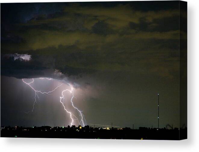 Colorado Lightning Storm Canvas Print featuring the photograph Lightning Man in the Clouds by James BO Insogna