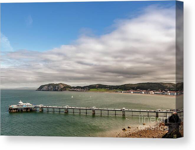 Llandudno Canvas Print featuring the photograph Llandudno Pier by Adrian Evans