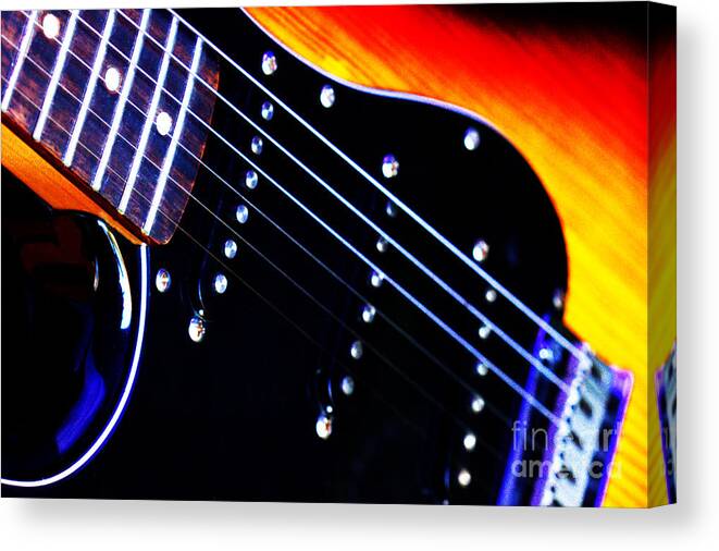Instrument Canvas Print featuring the photograph Lone Guitar by Stephen Melia