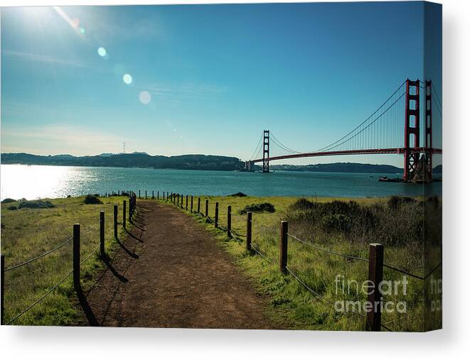 Bridge Canvas Print featuring the photograph Lonely path with the golden gate bridge in the background by Amanda Mohler